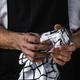 Image for article titled Bartenders are wearing a small pin for a big reason